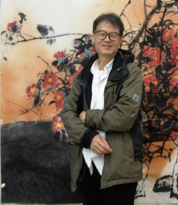 尹文红：妙笔绘孔雀，墨韵展风华
