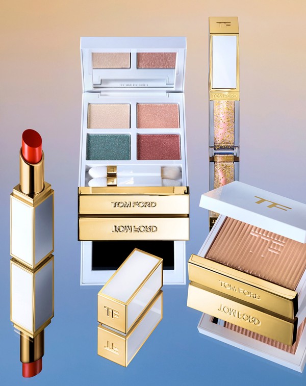 Tom Ford Beauty products photographed on a mirrored surface.