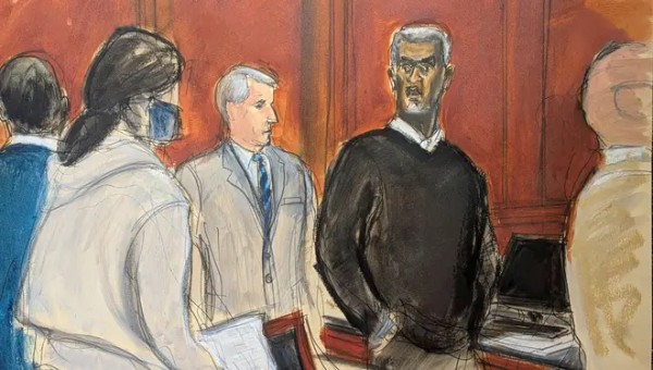 Sean 'Diddy' Combs, right, stands and looks at jurors as they file into the jury box at the start of jury selection.