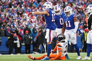 Why is Buffalo’s fan base called ‘Bills Mafia’ and why do they jump on tables?