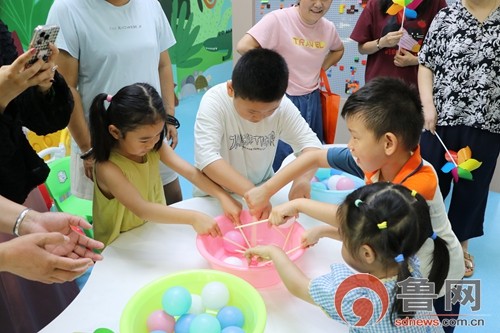 枣庄市市中区垎塔埠街道光兴里社区开展“夏日童趣欢乐行”暑期亲子互动嘉年华活动