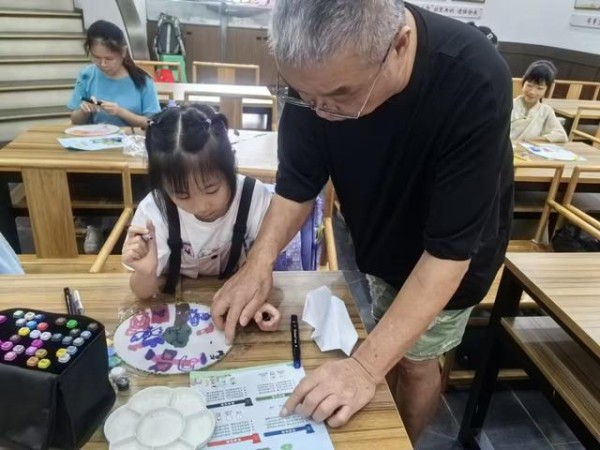 图为活动现场。九龙坡区城市管理局供图
