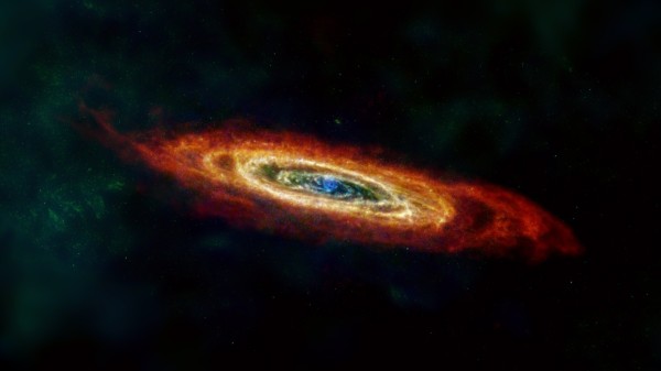 仙女座星系M31 是銀河系鄰近最大的星系。這張影像結合了美國航太總署和歐洲太空局(European Space Agency)的數據:紅色表示氫氣、綠色表示低溫的灰塵、藍色則是較溫暖的塵埃。Photograph by ESA/NASA/JPL-Caltech/GBT/WSRT/IRAM/C. Clark (STScI)