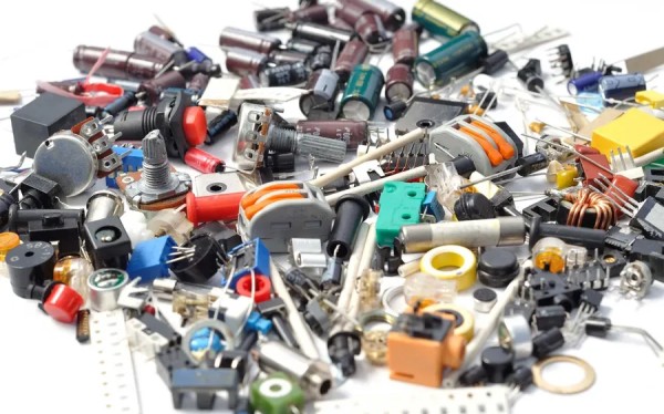 An electronics store display with capacitors and other electronic components.
