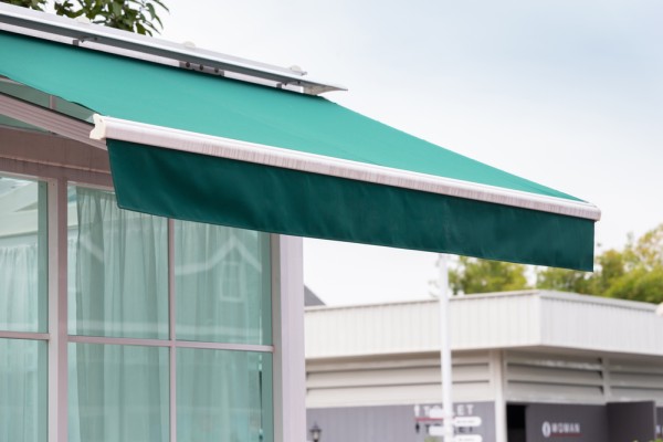 Green awning properly sized to fit a window