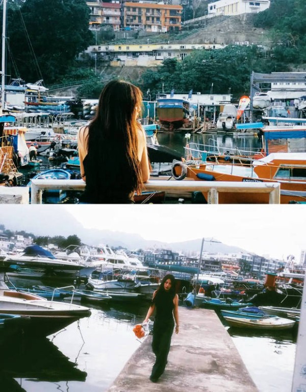 马思纯在码头悠闲漫步，十分惬意。